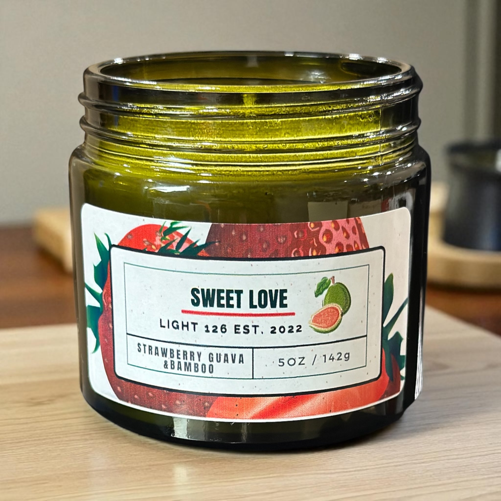 Light126 Candle Co. Strawberry Guava and Bamboo Candle.