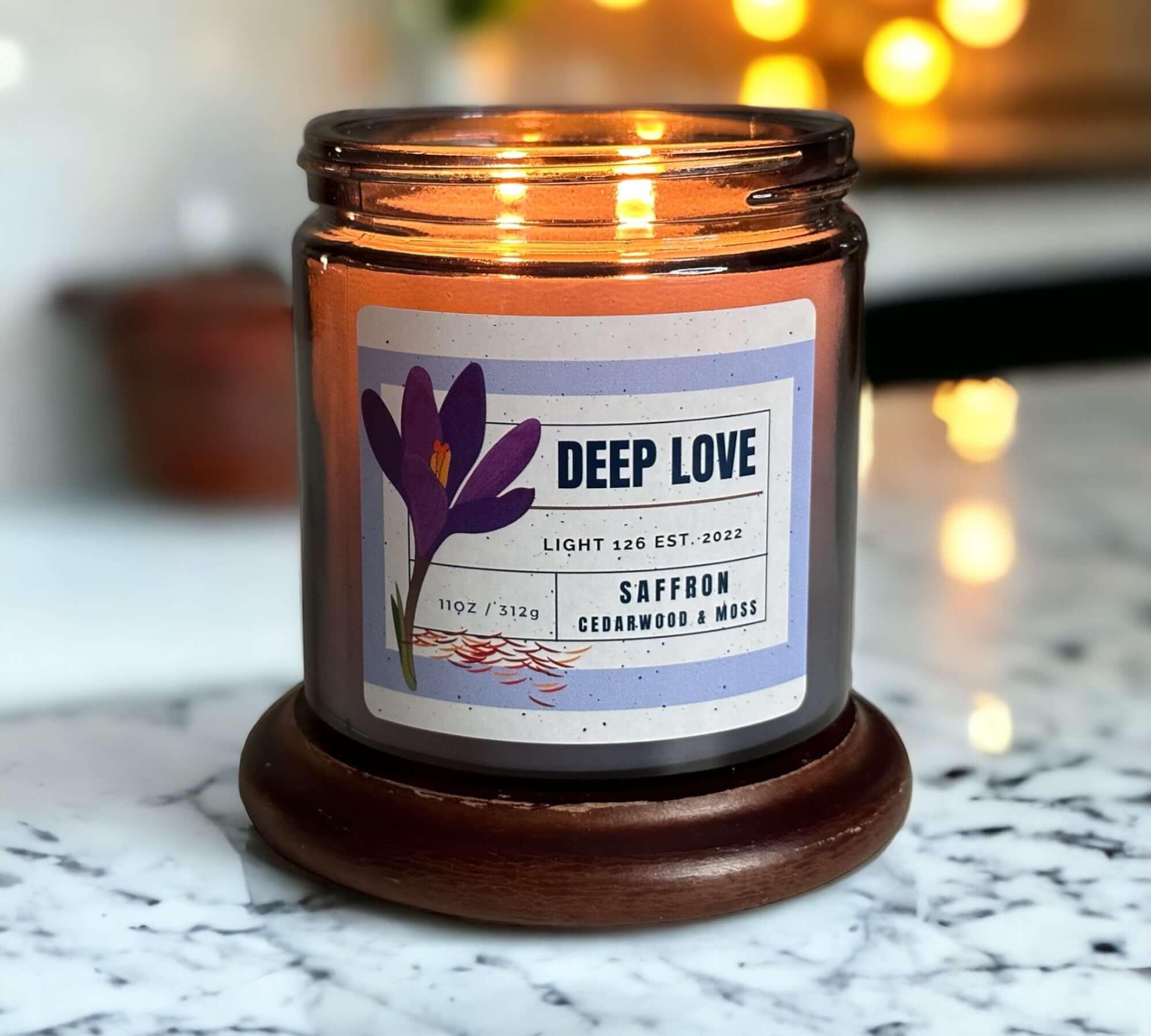 Deep Love scented candle. Saffron cedarwood and moss fragrance.