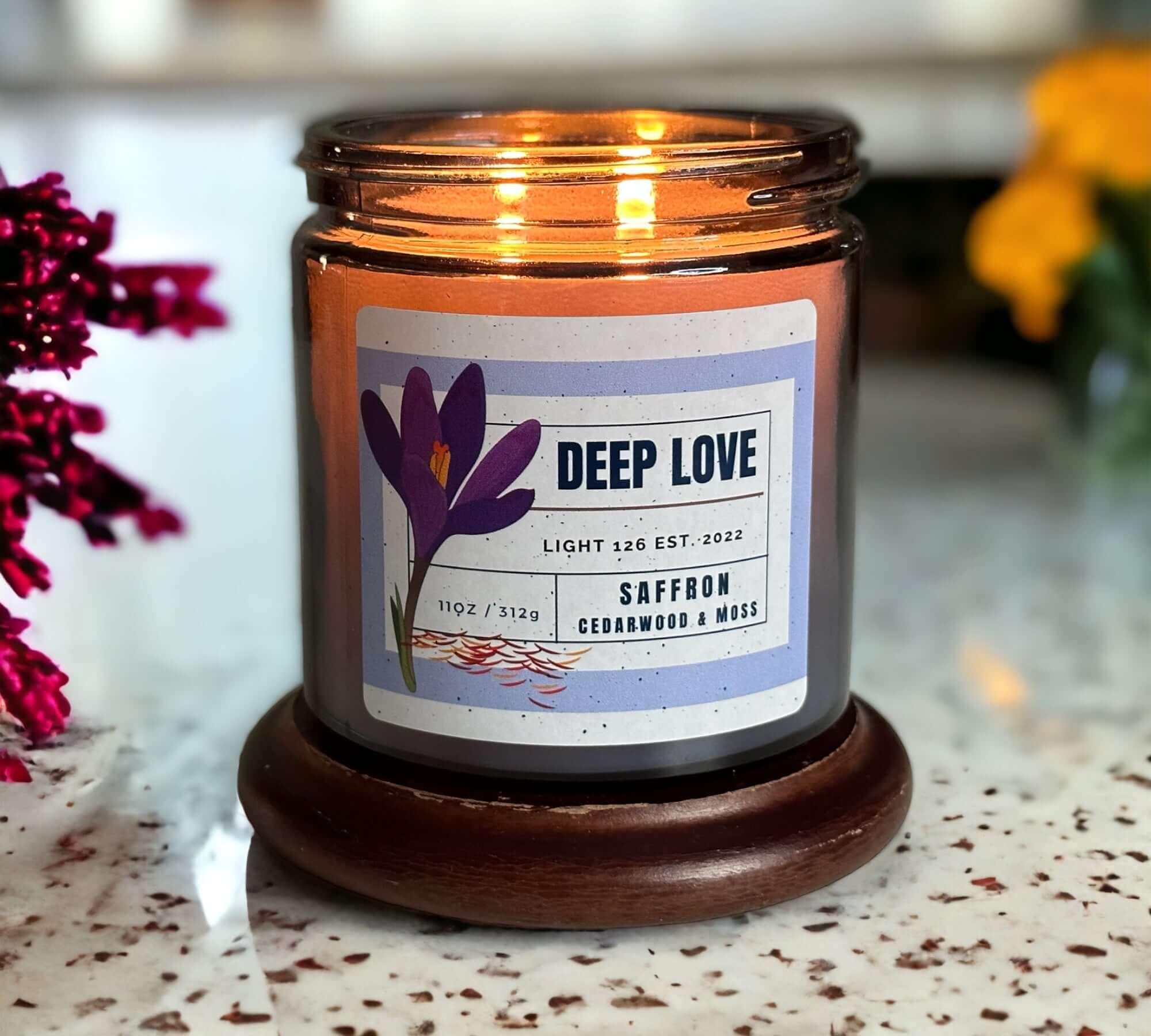 Deep Love scented candle. Saffron cedarwood and moss fragrance.