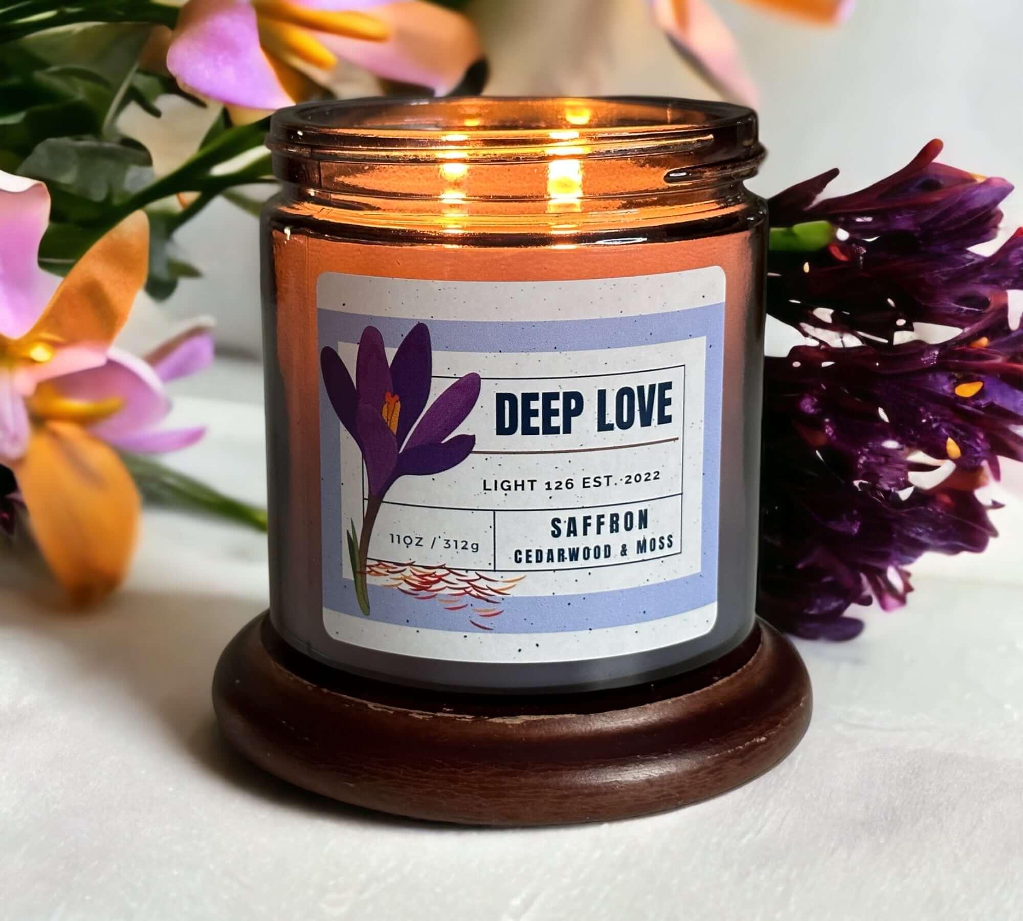 Deep Love scented candle. Saffron cedarwood and moss fragrance.